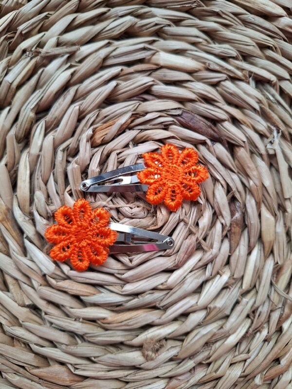 Oranje bloemen klikklak ~ 4 cm